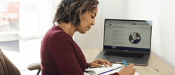 woman-working-on-laptop-with-prosci-methodology