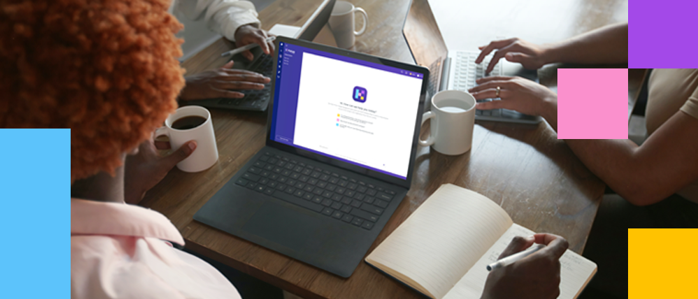 Person at a desk using Kaiya on a laptop with several other people working from laptops